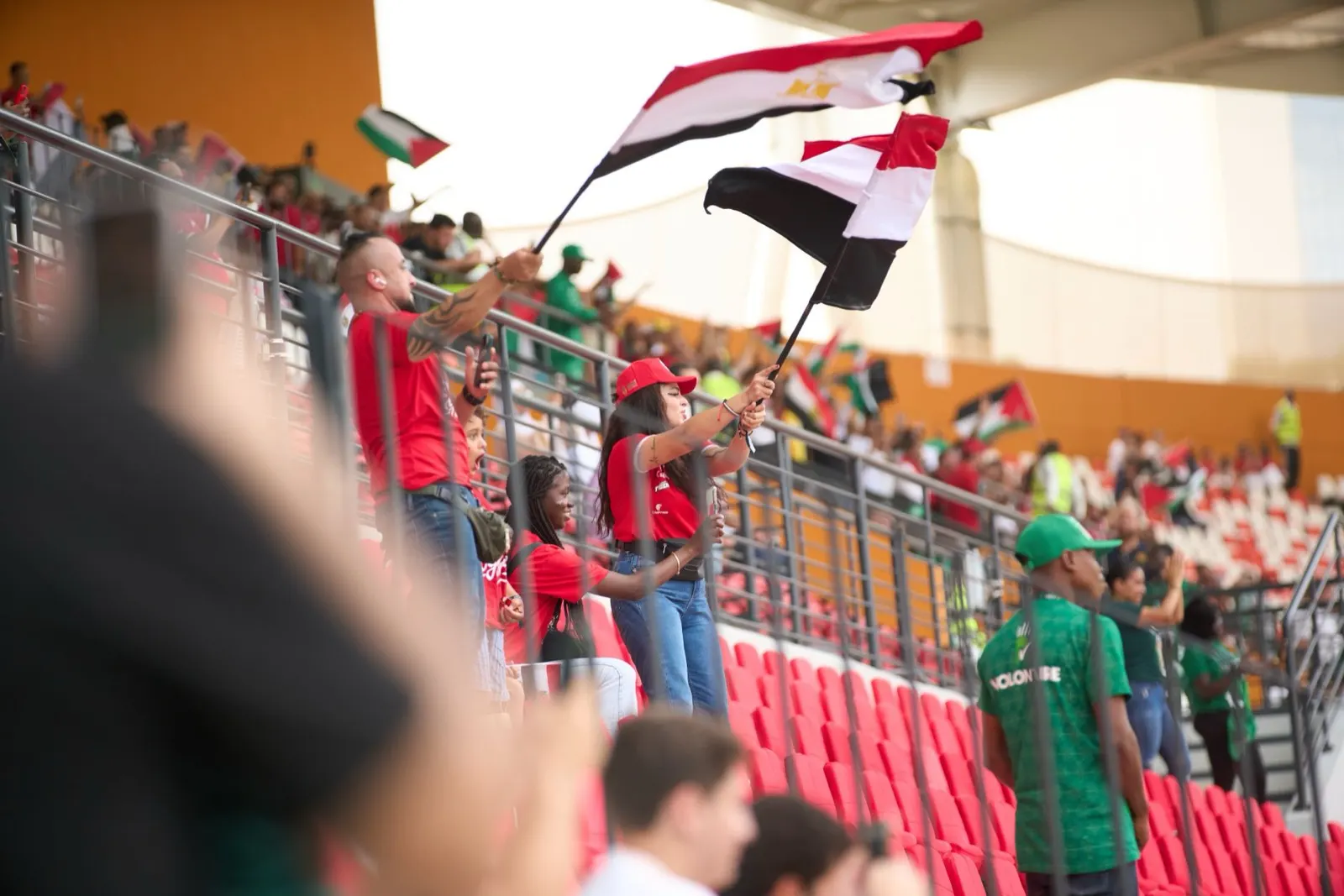 Generic stadium crowd in the stands, no team branding visible