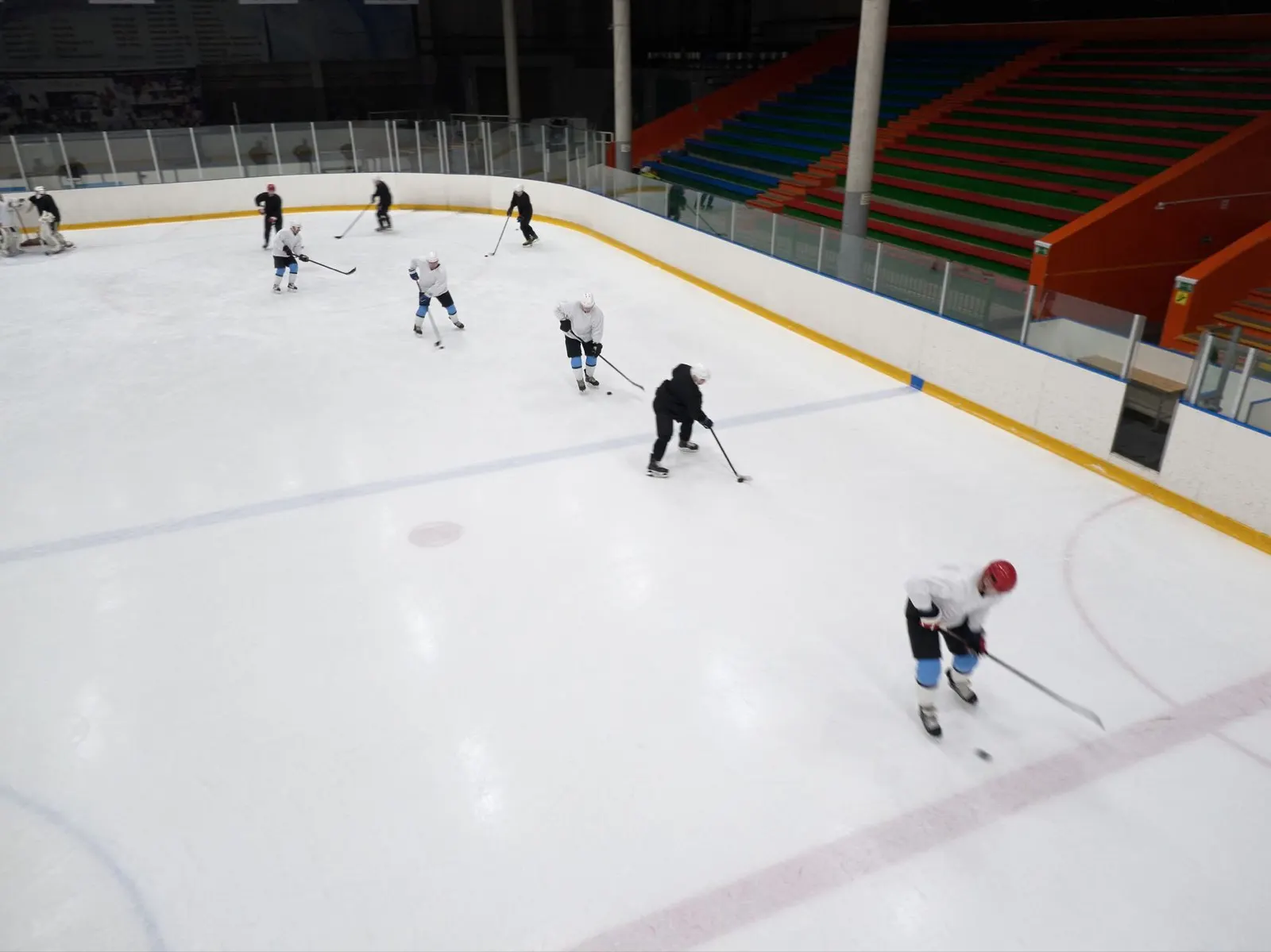 Empty generic ice hockey rink, no team branding visible